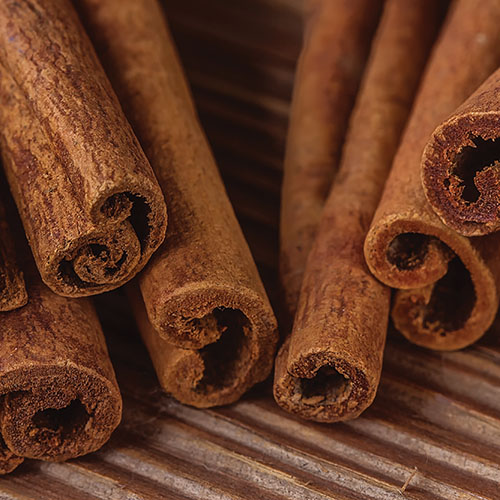 Bunch of cinnamon sticks. selective focus. Can be used as background
